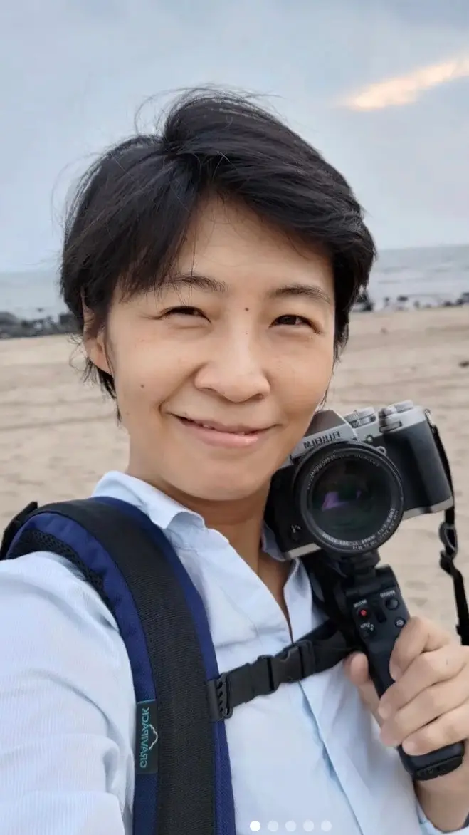 Photographe avec sac à dos exosquelette Gravipack à Tapei