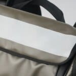 professionnel du chantier portant un sac ergonomique, vue de dos, solution de portage GRAVIPACK
