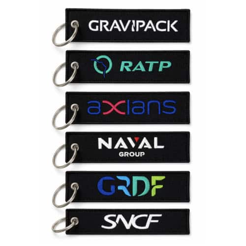 Porte clé professionnel Gravipack avec exosquelette intégré, conçu pour améliorer le confort lors des déplacements