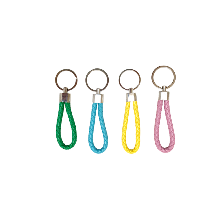 Porte-clés Gravipack disponible en plusieurs couleurs à fixer sur un sac à dos ou un bagage